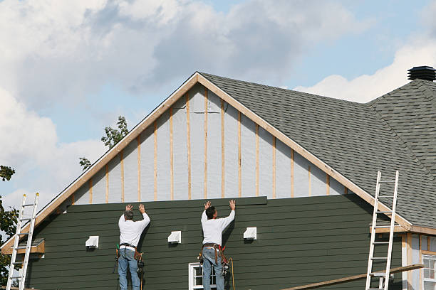 Professional Storm Damage Siding Repair technician working in Franklin Square, NY